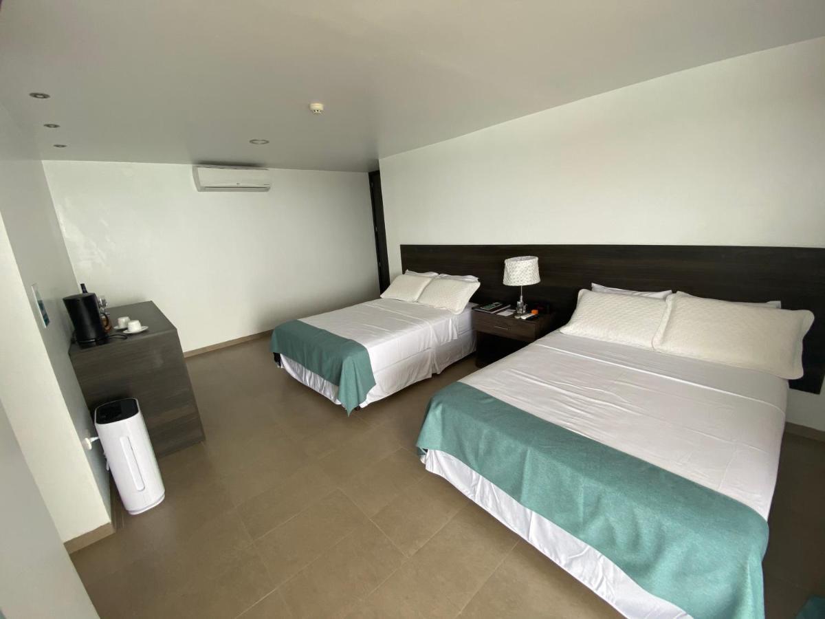 Galapagos Sunset Hotel ปูแอร์โต บาเกริโซ โมเรโน ภายนอก รูปภาพ